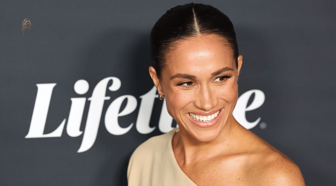 Meghan Markle with slicked-back dark hair and a sleeveless nude top, showcasing a triangle face shape with poise and elegance at a Lifetime event.
