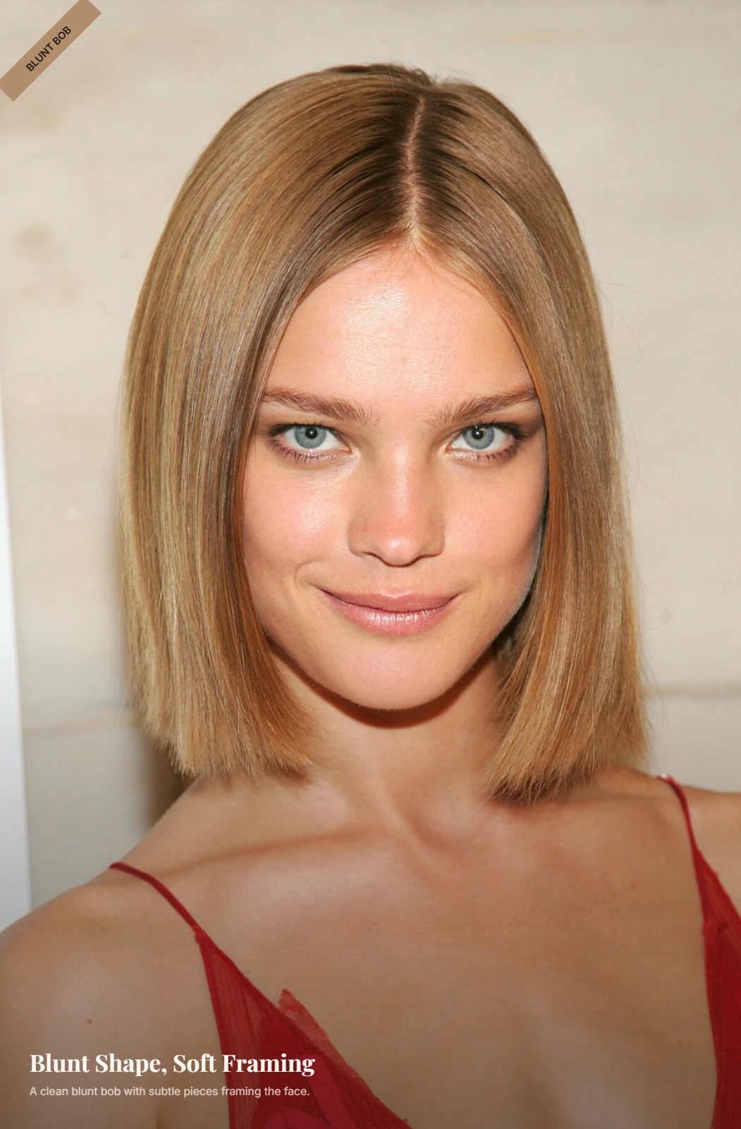 Woman with an oval face wearing a straight blunt bob with soft face-framing pieces