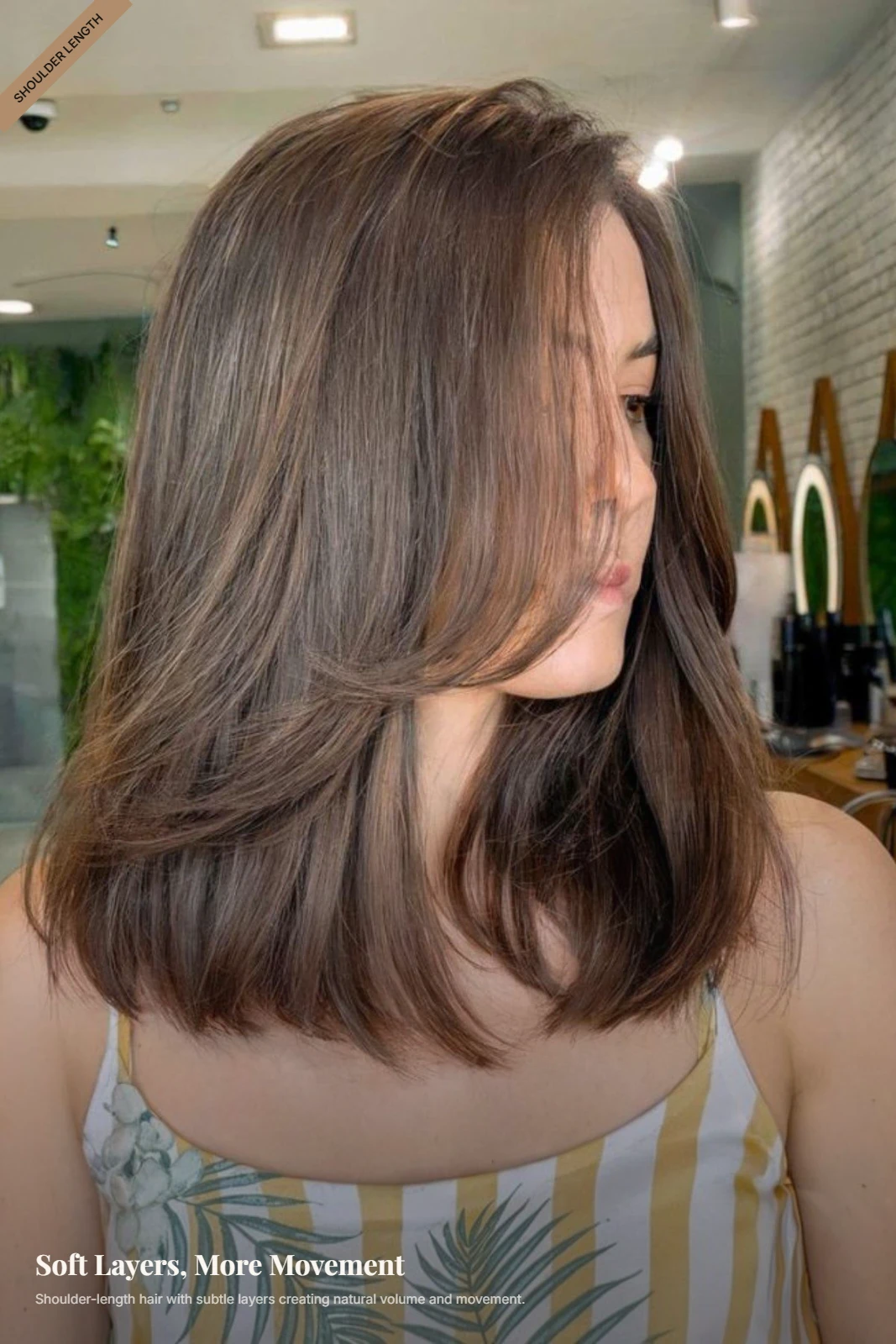 Woman with shoulder-length hair and subtle layers creating soft volume and movement