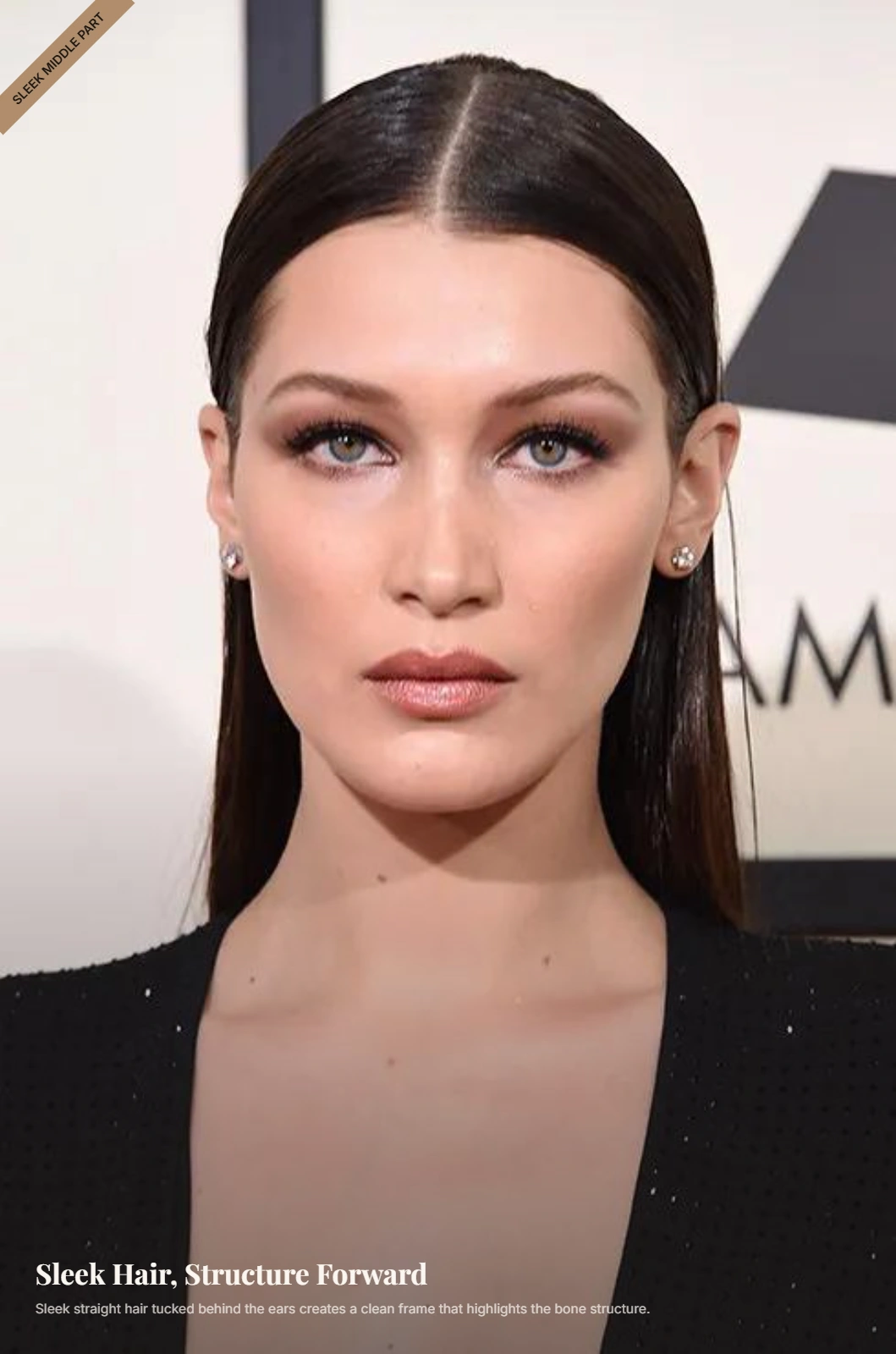 Woman with a diamond-shaped face wearing sleek straight hair tucked behind both ears