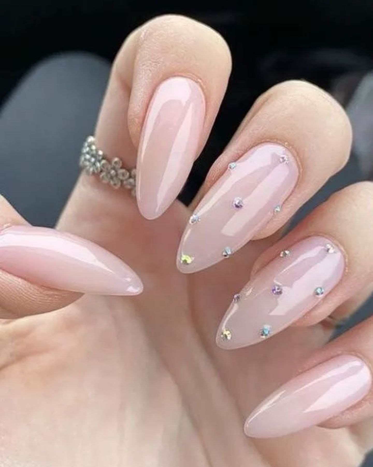 Close-up of Hailey Bieber Glazed Donut Nails with a smooth chrome finish, showcasing a minimalistic, elegant look with a shiny, polished surface.