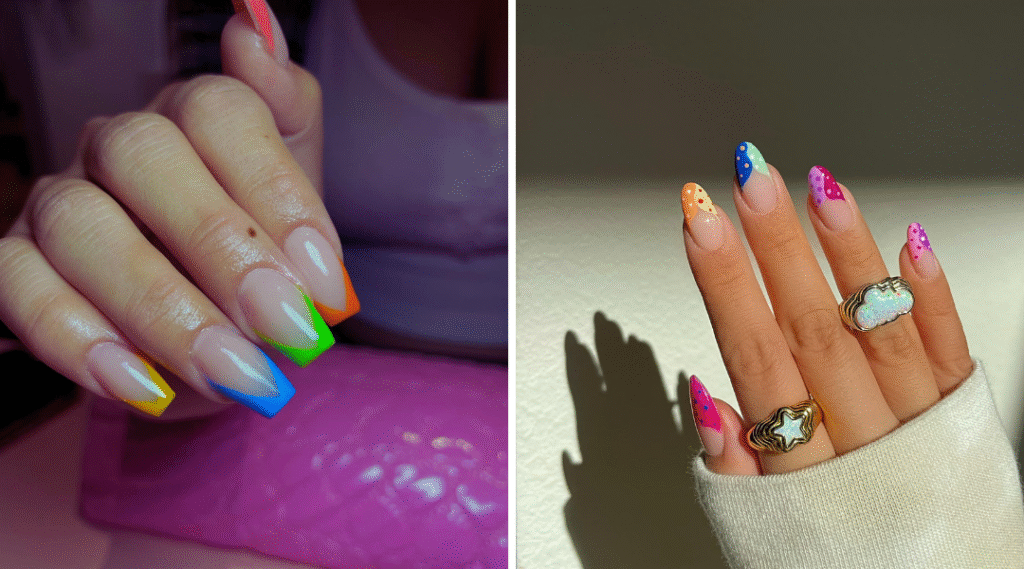 Long V-cut nails with vibrant gradient colors from yellow to green on a glossy finish worn with star and cloud rings against a mixed soft purple and light background illuminated by natural sunlight