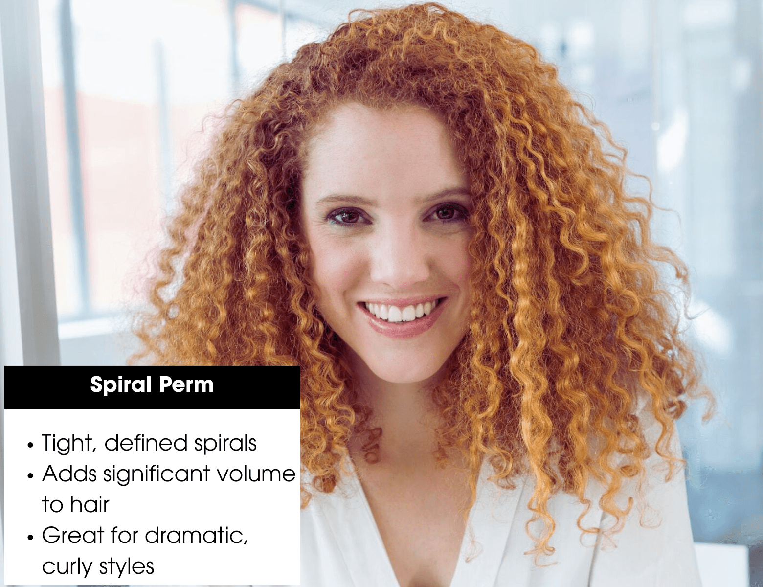 Woman with tight spiral perm curls showcasing dramatic volume and defined, bouncy spirals for bold curly styles.