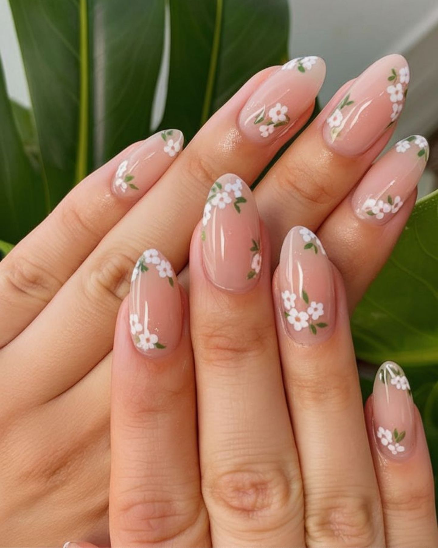 Summer Nude + Flowers Nail Art featuring a soft nude base with delicate floral designs, perfect for a fresh, feminine, and seasonal summer look.