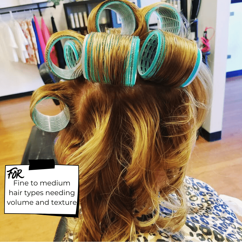 Close-up of velcro rollers adding bouncy curls to fine hair without heat
