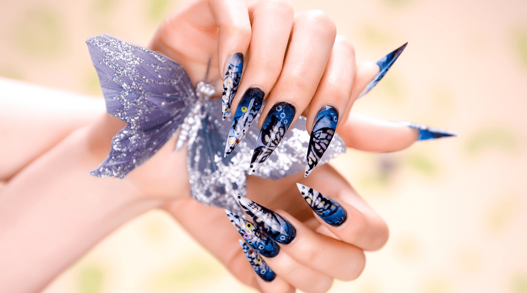 Close-up of a beautifully manicured hand showcasing elegant nail art