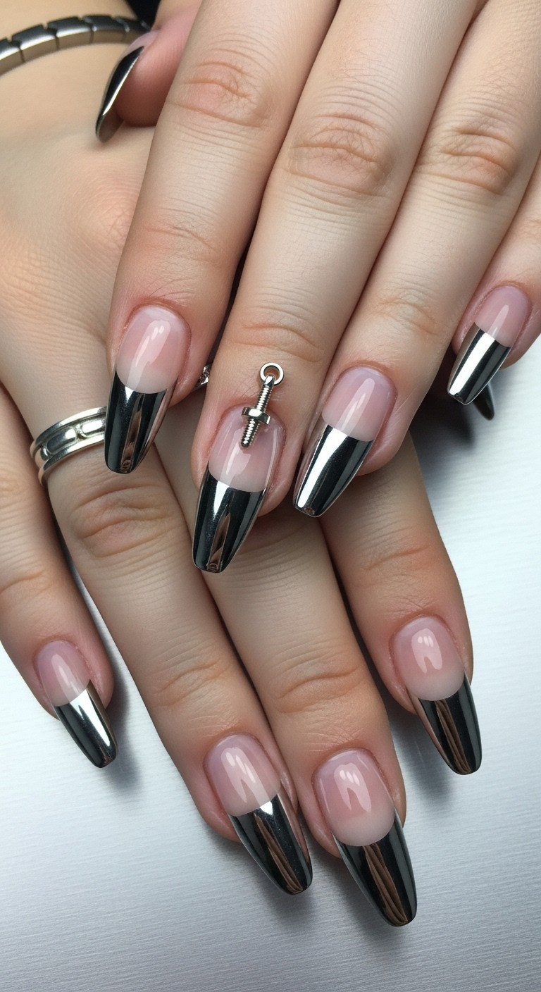 Almond nails with reflective chrome French tips and micro bolt charm on nude base, aluminum texture background