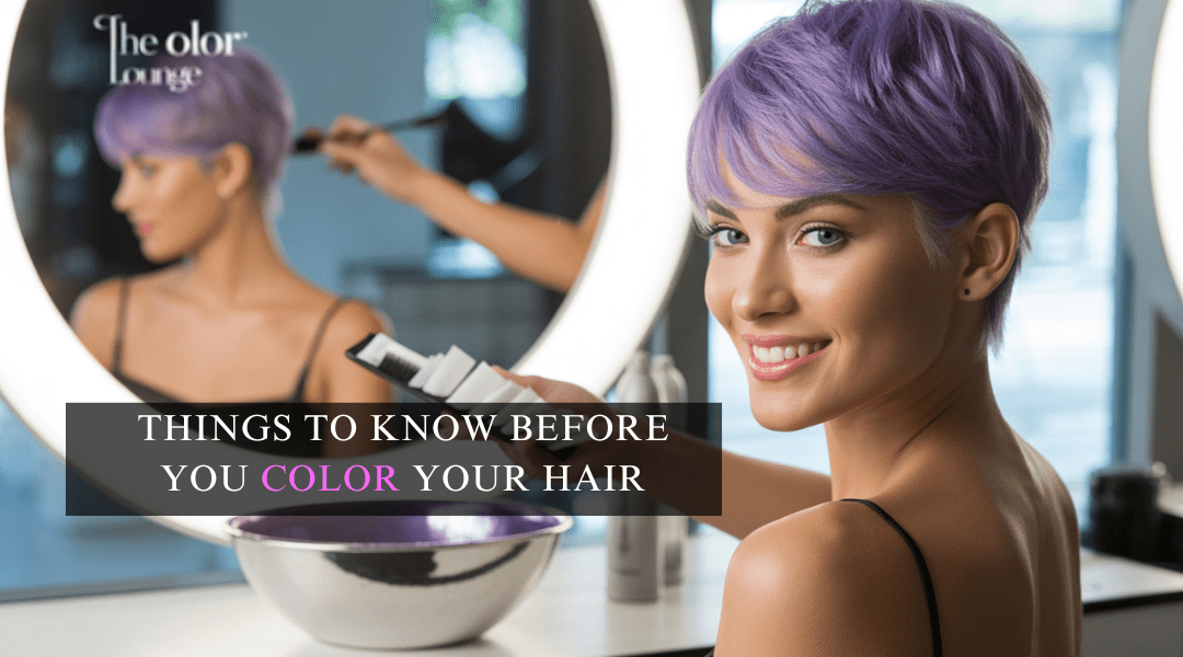 Featured image of a woman with freshly dyed hair in a modern salon, representing a guide on what to know before coloring your hair.