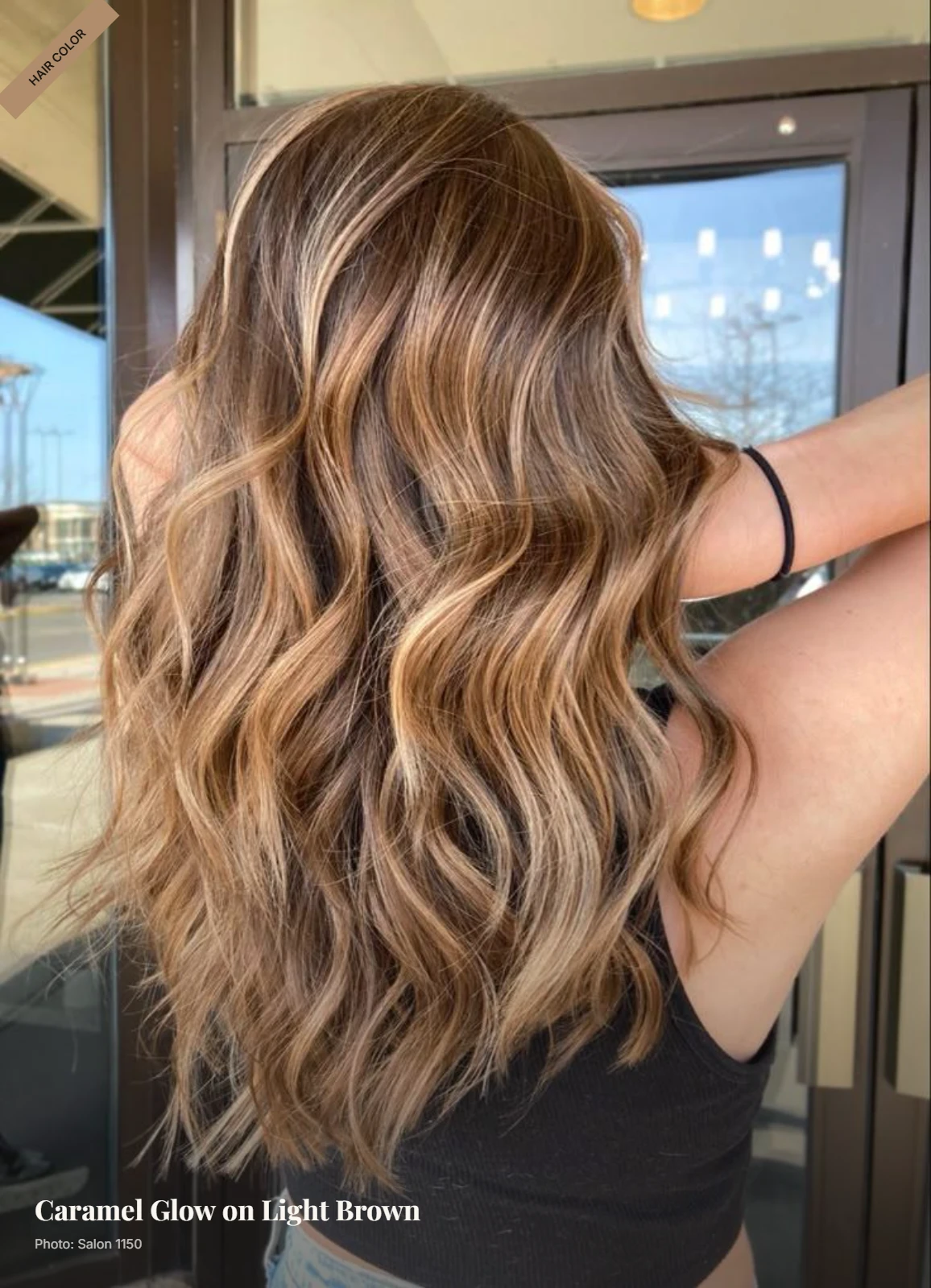 Light brown hair with softly blended caramel balayage styled in airy waves