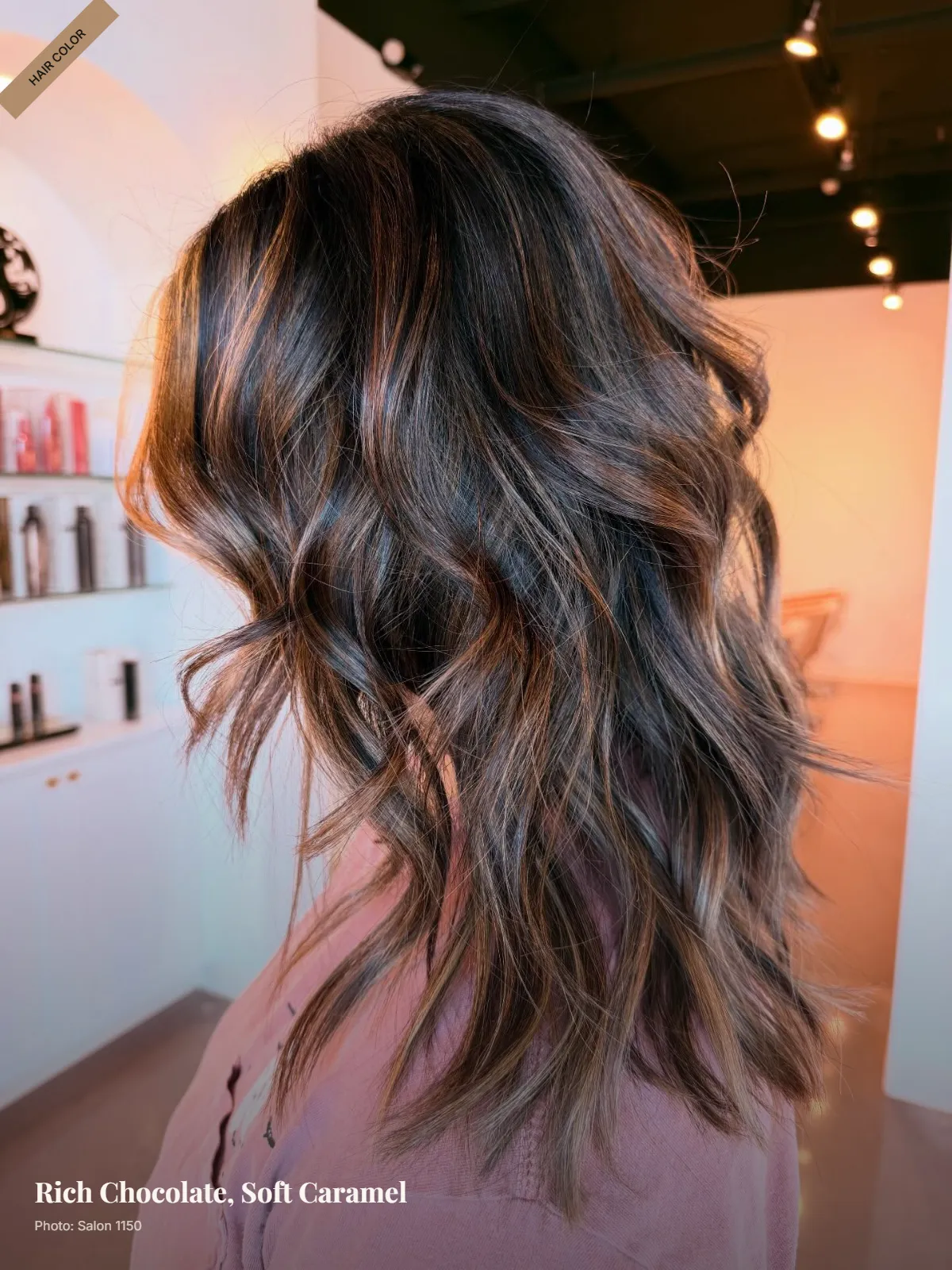 Deep chocolate brown hair with glossy caramel balayage ribbons in soft waves