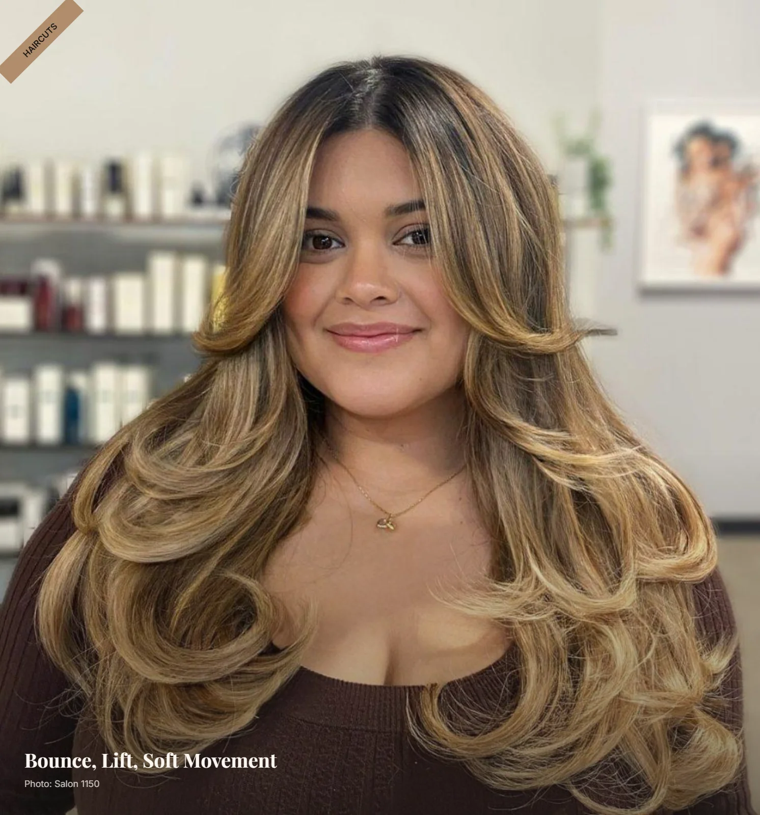 Voluminous butterfly cut with lifted crown and swooping layers framing a round face