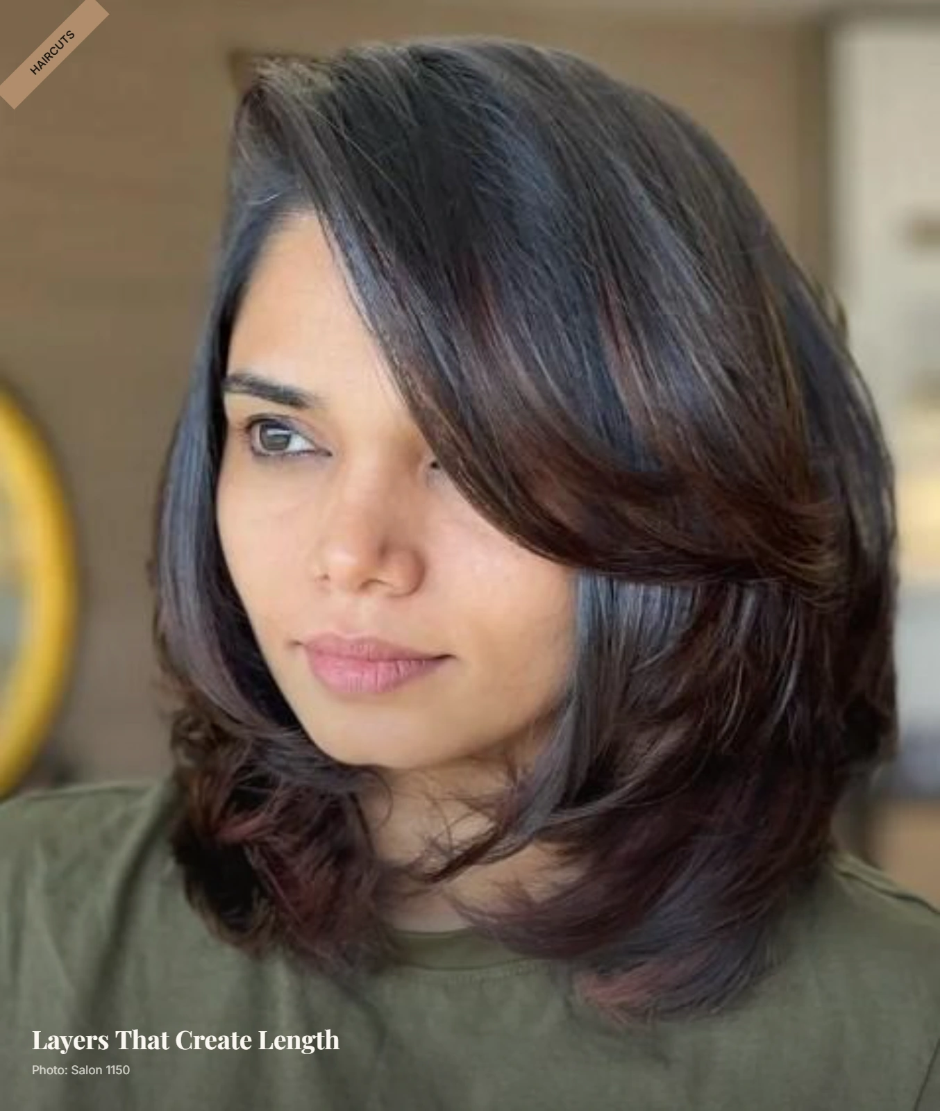 Medium-length defined layers with soft volume and face-framing movement around a round face