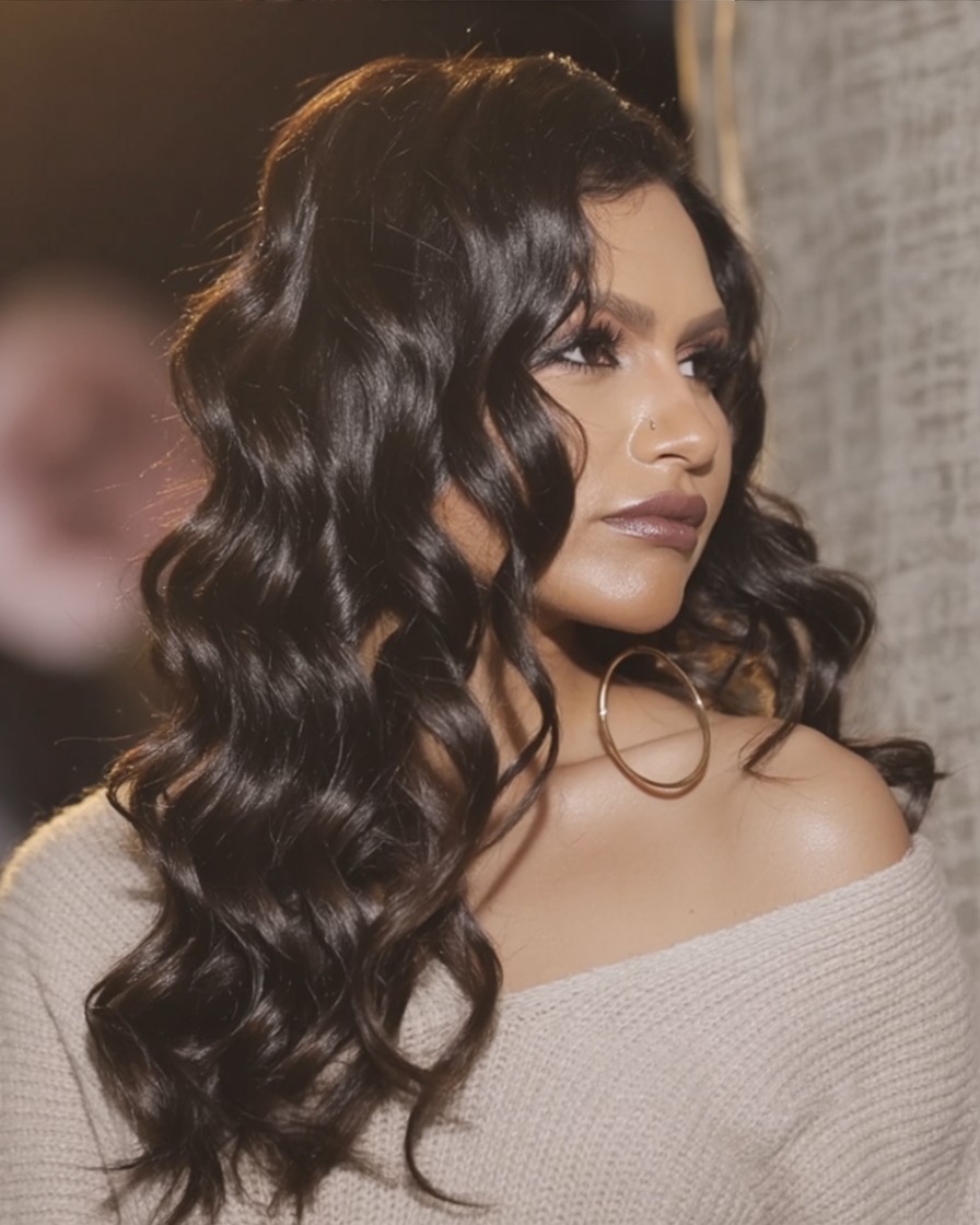 woman with long glam mermaid waves and glossy texture, flattering hairstyle for round face shape

