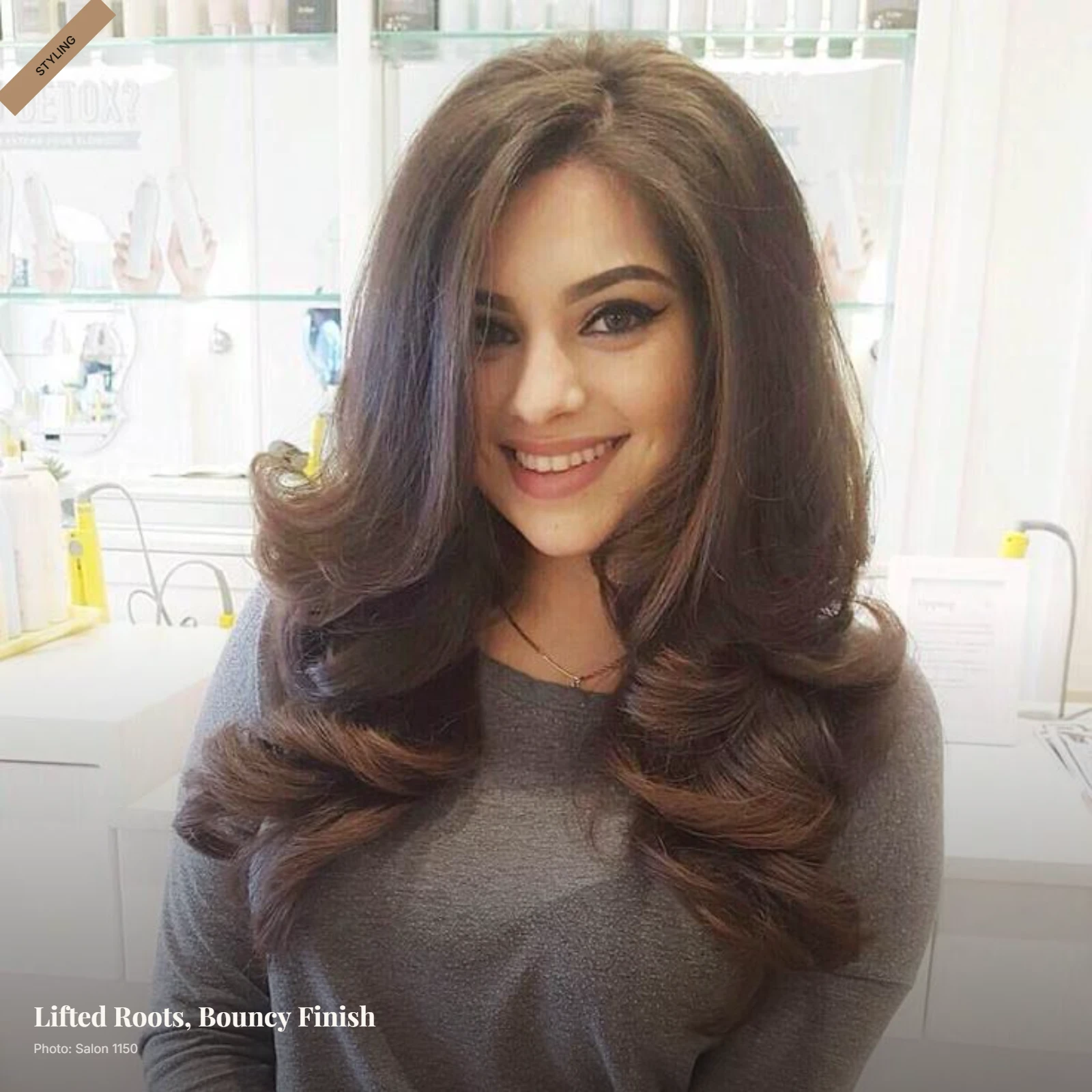 Voluminous blowout with lifted roots, bouncy layers and soft face-framing movement