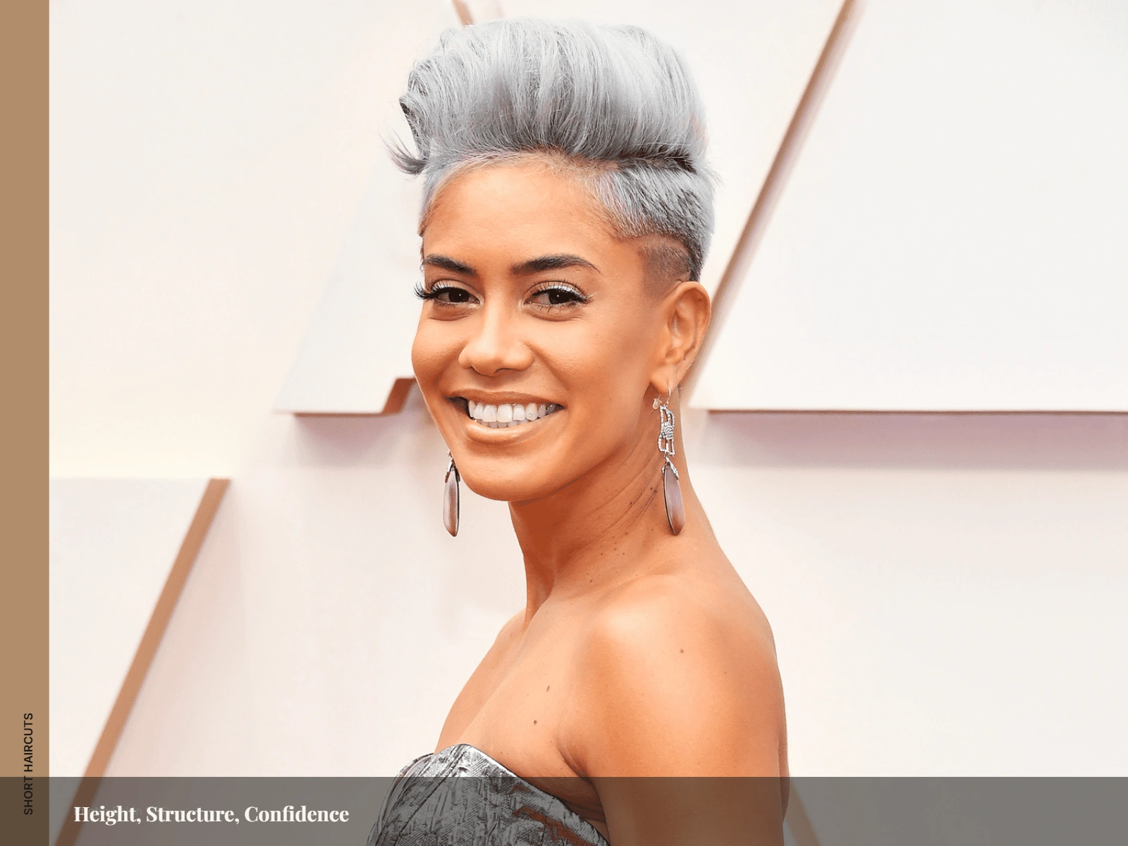 Voluminous faux hawk with tapered sides and lifted crown framing a round face