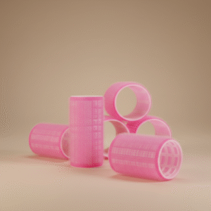 Pink Velcro hair rollers close-up showing texture and lightweight design for heatless curls