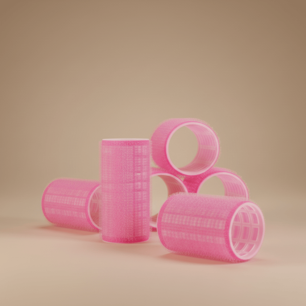 Pink Velcro hair rollers close-up showing texture and lightweight design for heatless curls