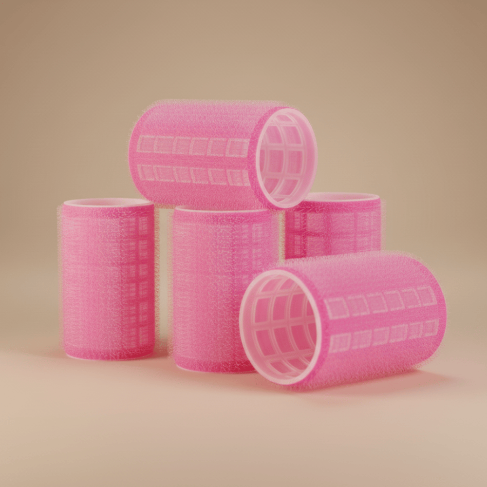 Pink Velcro hair rollers set shown at an angle for heatless curls and volume