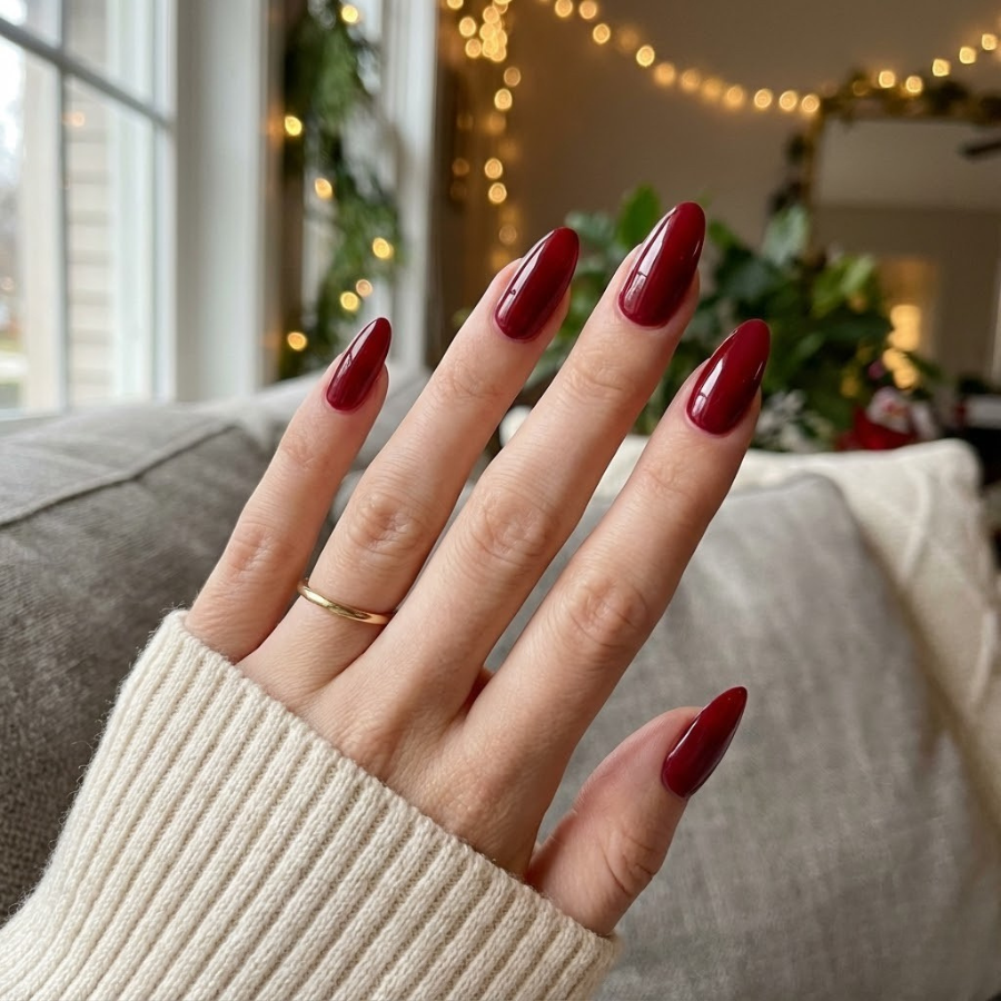 Long Christmas nail with a smooth glossy finish in a festive holiday color