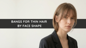 Woman with thin hair and soft bangs, representing how different bang styles work by face shape.