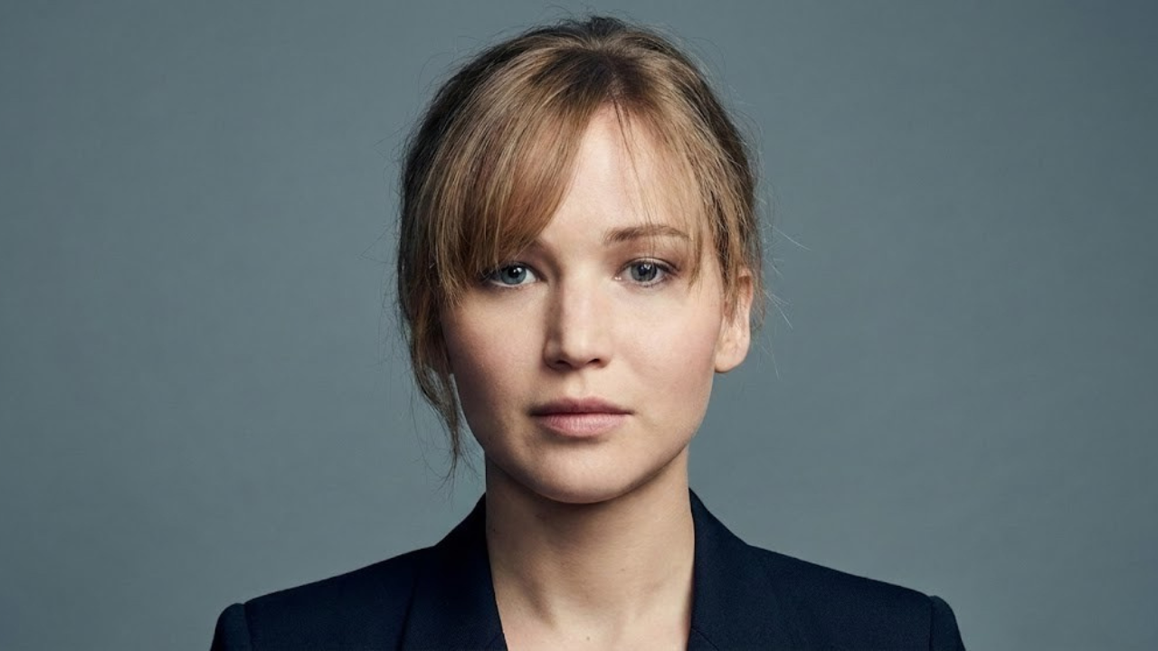 Asymmetrical bangs on a round face with thin hair, showing how a denser side creates intentional imbalance while the lighter side stays airy instead of patchy.