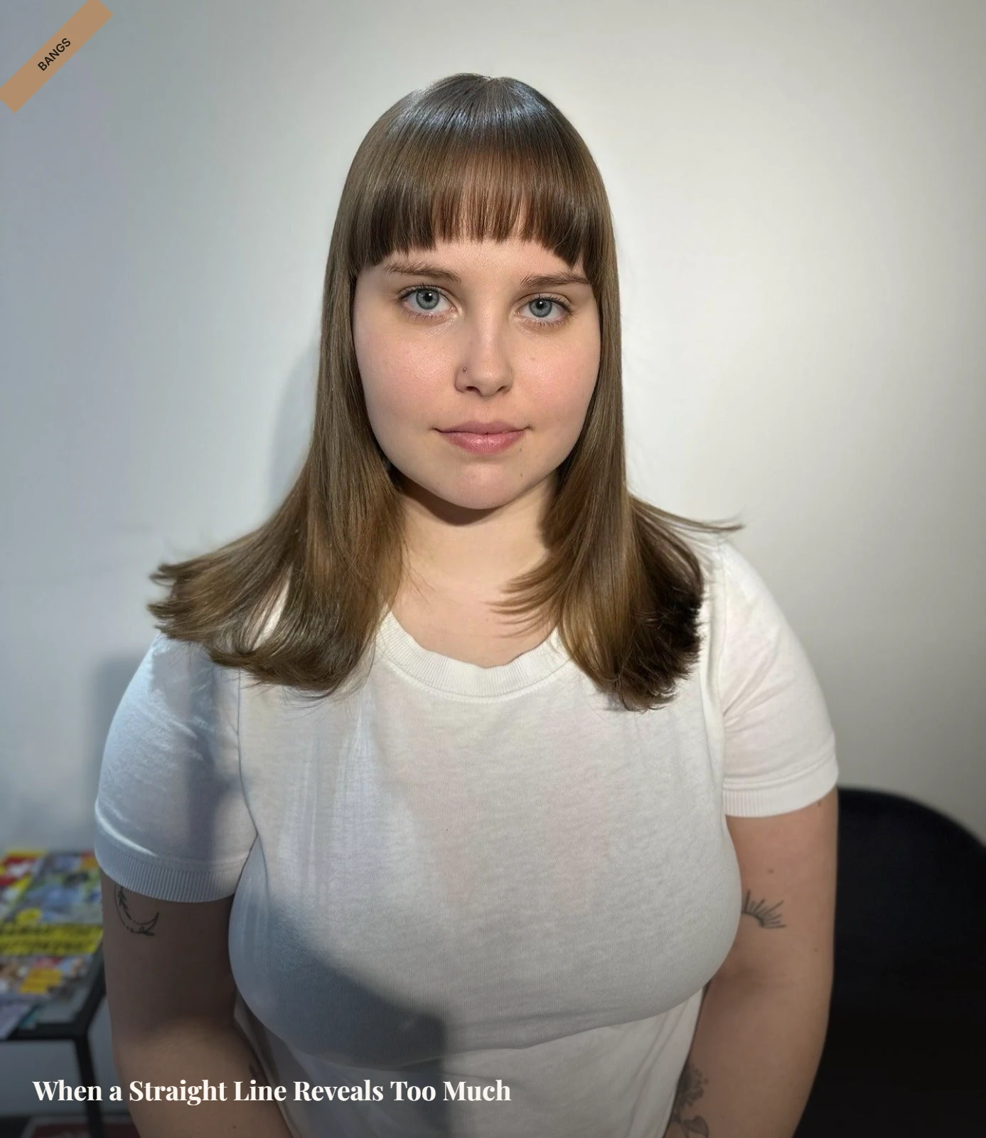 Blunt micro fringe on thin hair showing a short straight line and visible gaps across a round face