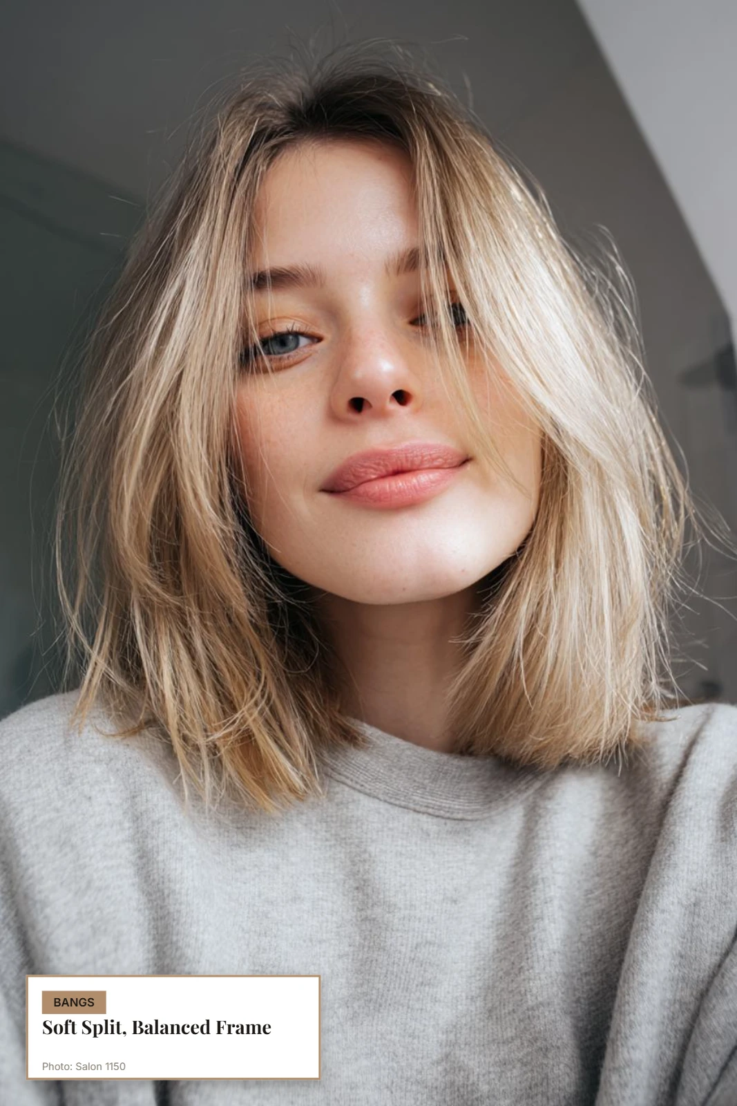 Soft curtain bangs on thin hair with a light center split framing an oval face