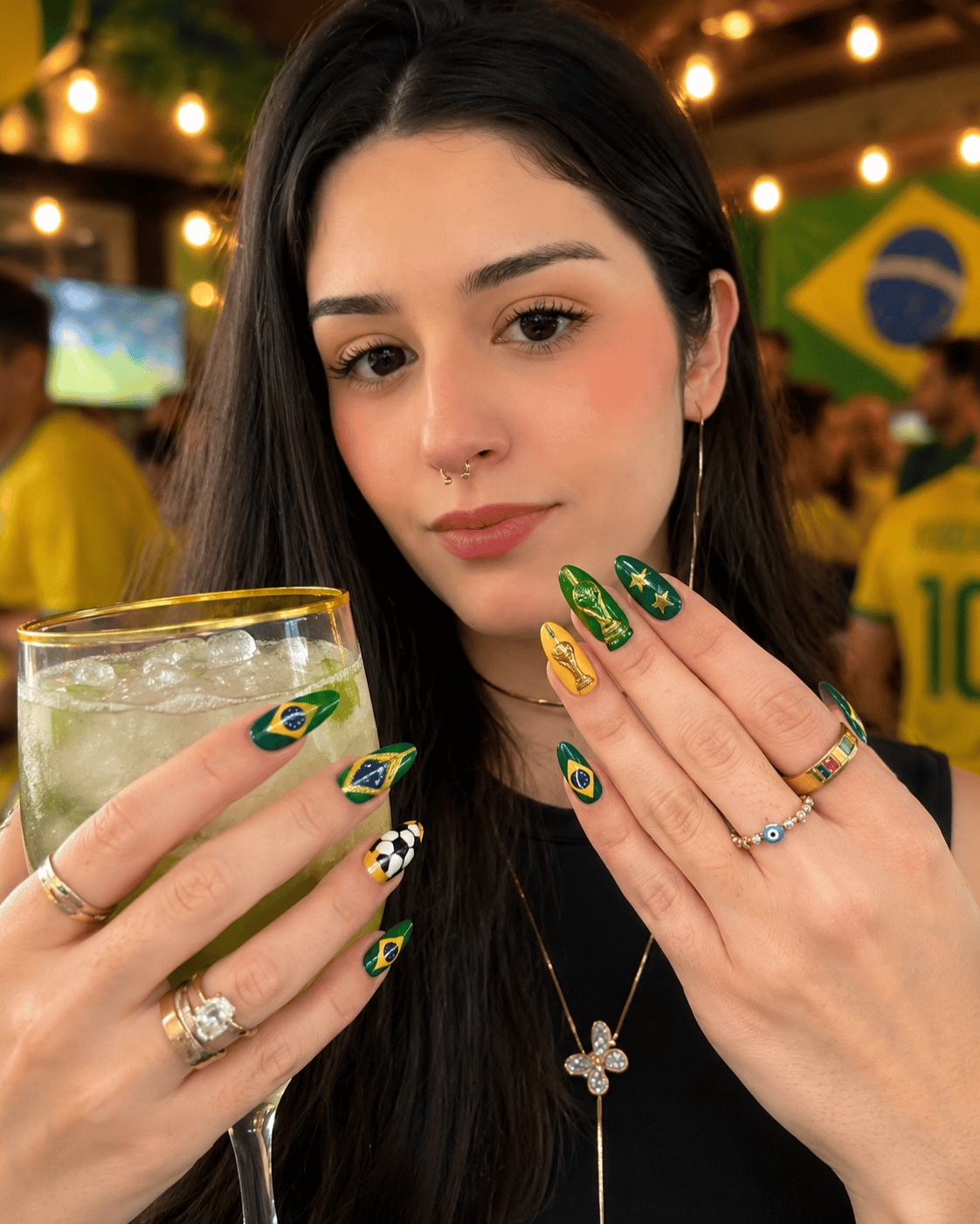 Brazil championship nails featuring football-inspired nail art with trophy details and national team colors.