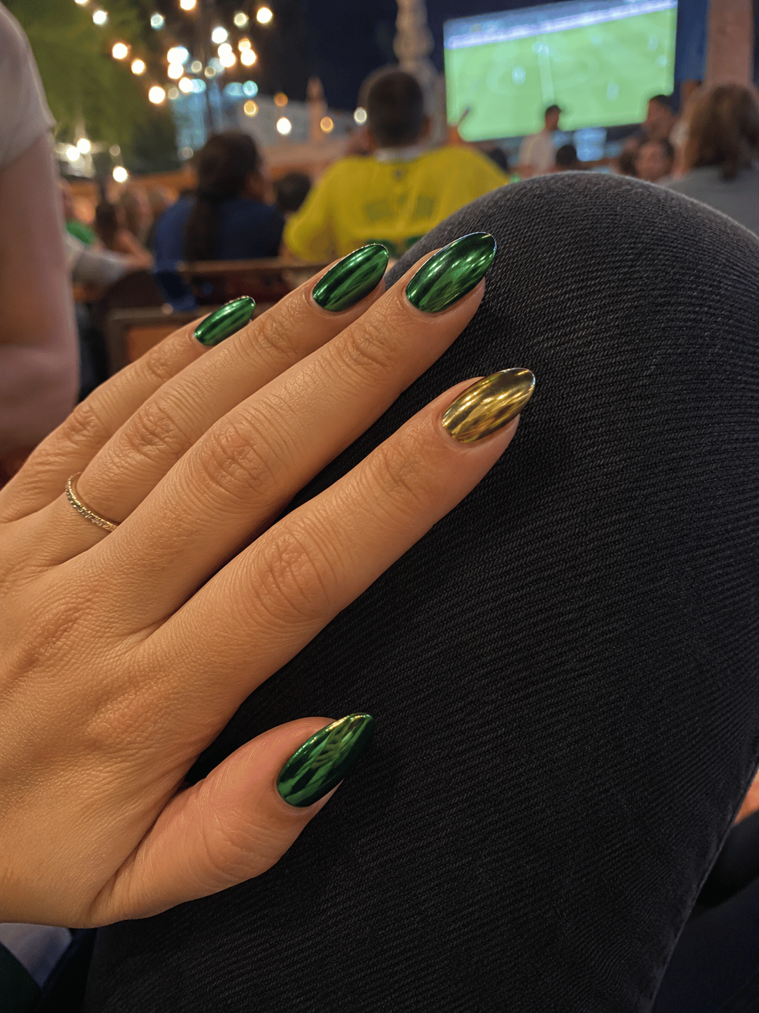 Chrome Brazil nails with deep green chrome almond nails and a gold accent nail inspired by Brazil football colors