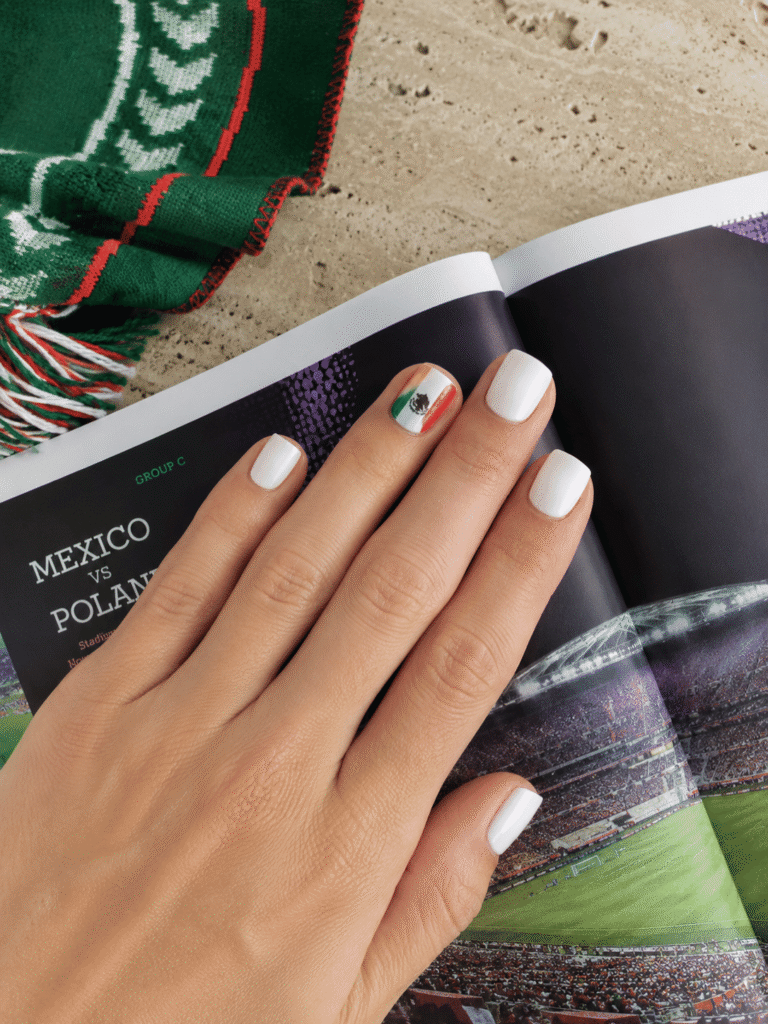 Simple Mexico flag nail design with a white base, tricolor stripe accent and minimalist eagle silhouette on short square nails for FIFA World Cup 2026.