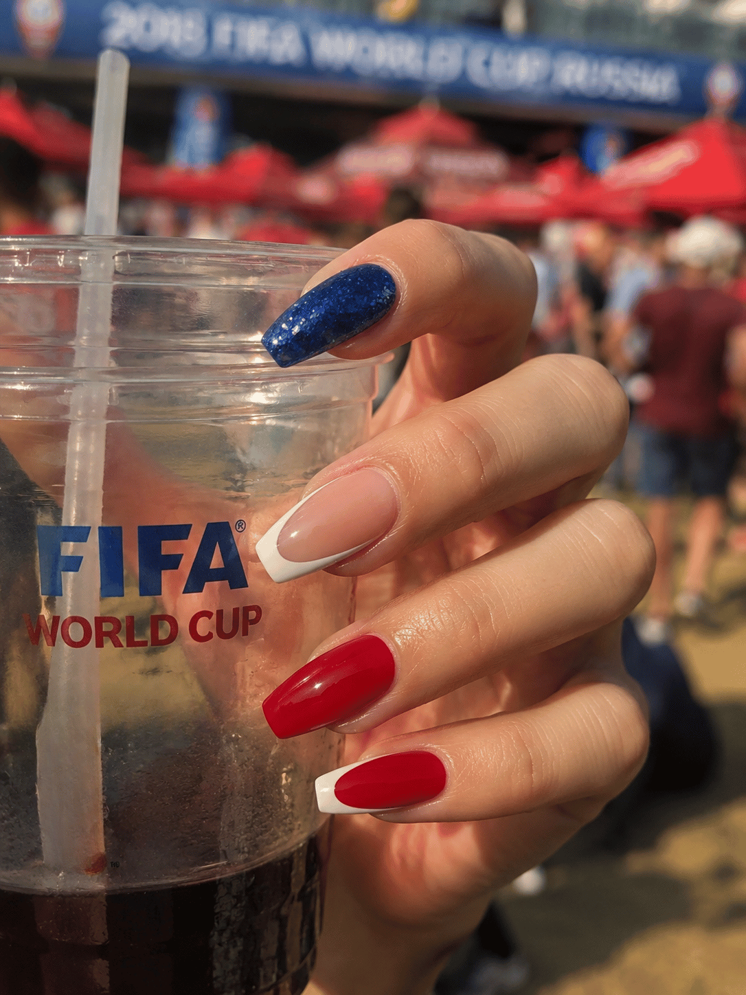 USA soccer coffin nails with red polish, white French tips and cobalt blue glitter accent for FIFA World Cup 2026 match day style
