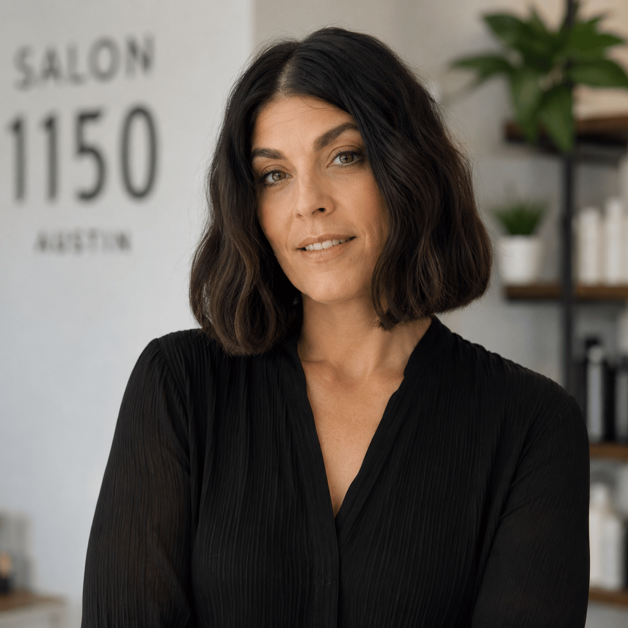 Leah Webb, owner of Salon 1150 in Austin, TX, specializing in lived-in color, balayage, blonding, color correction, and dry cutting.