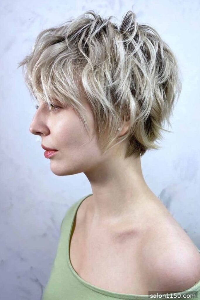 Shaggy textured bixie haircut in 90s style, side profile