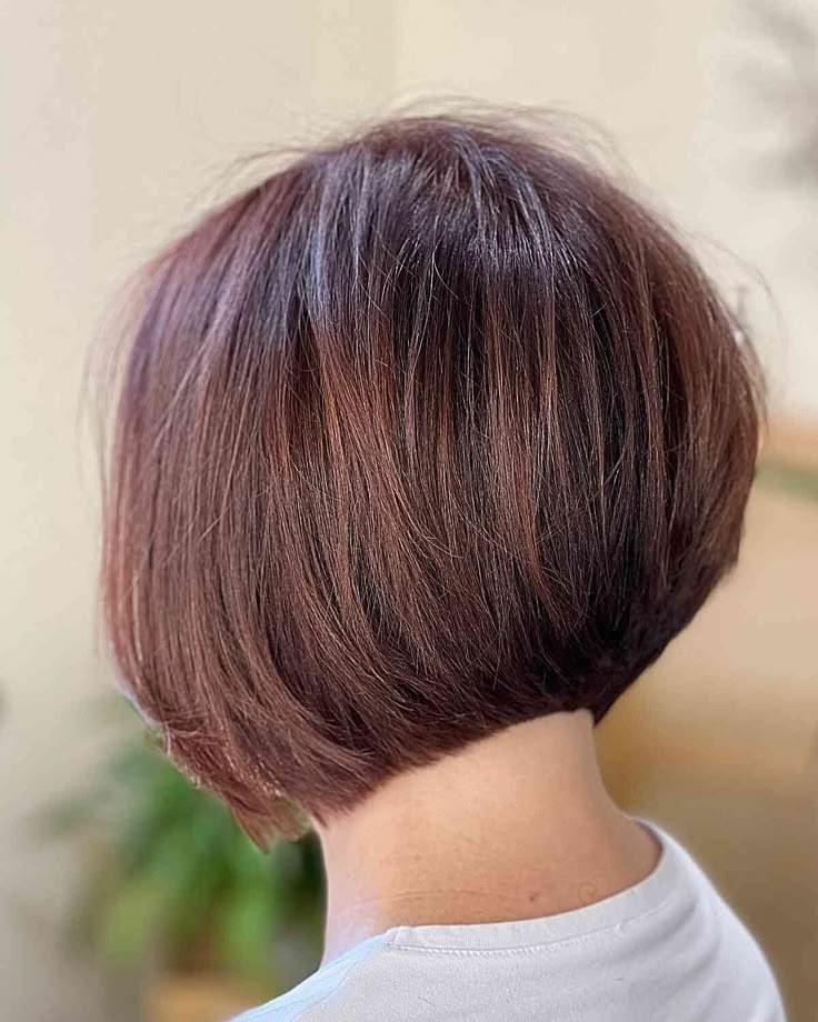 Dark caramel hair color on a chin-length blunt bob