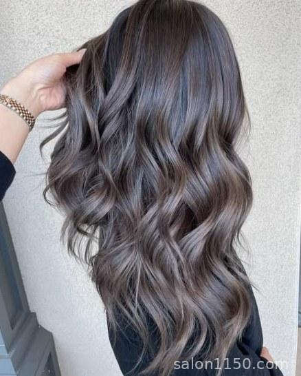 Dark mushroom brown hair color with smoky ash tones on naturally dark hair