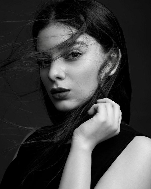 Sleek jet-black glossy hair